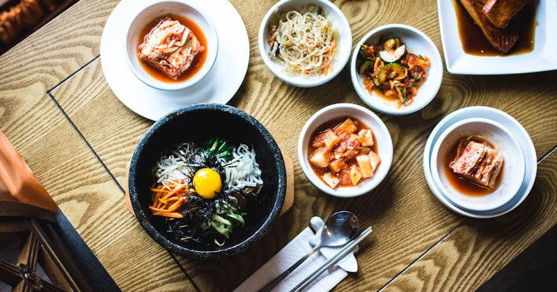 Traditional Korean bibimbap and banchan dishes for gut health and skin wellness